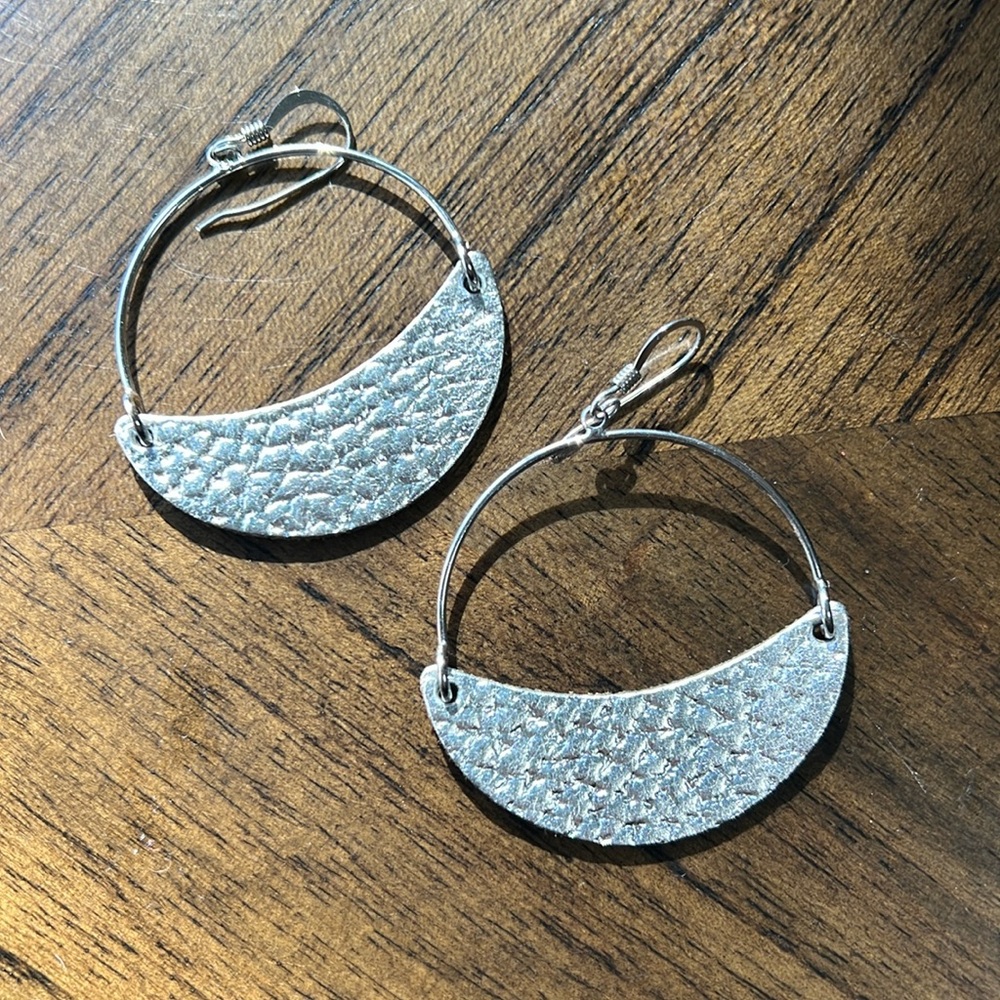 Nickel and Suede leather earrings- silver hammered Asters- worn twice!!